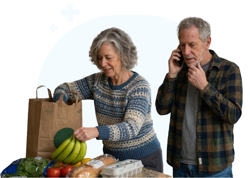 Senior on phone checking eligibility for a CSNP plan with his wife